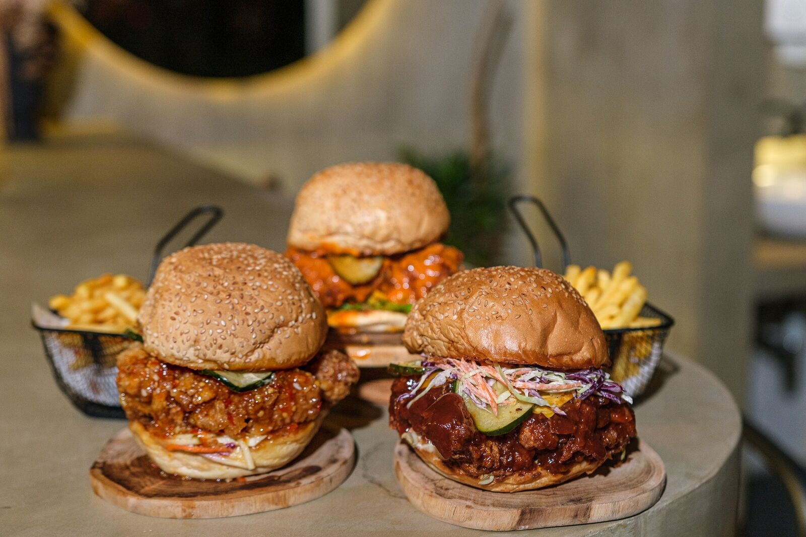 Fried-chicken burgers with fries